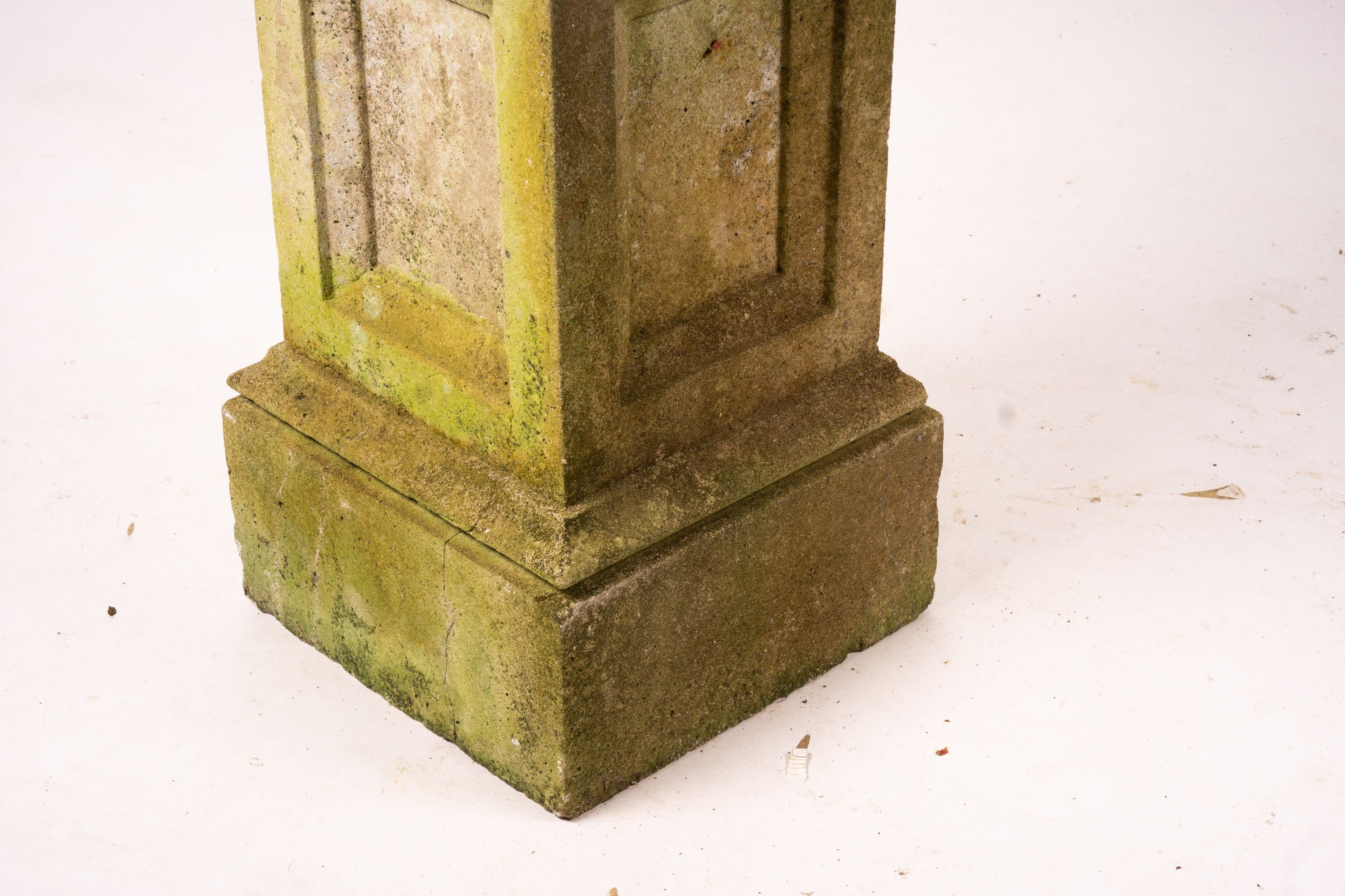 A pair of reconstituted stone circular garden planters on pedestal bases, diameter 45cm, height 110cm